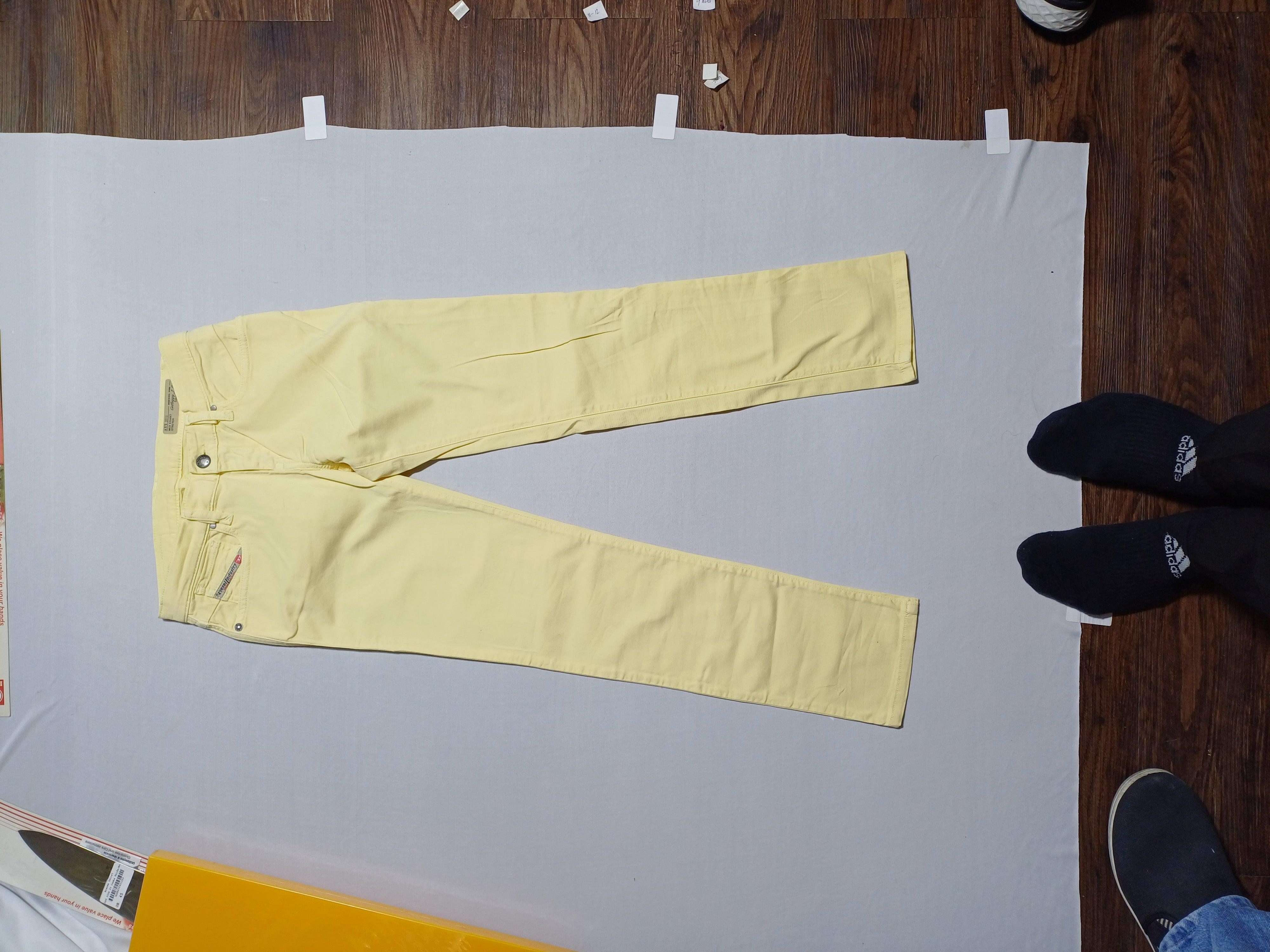 جينز ديزل أصفر للبنات KXAN7